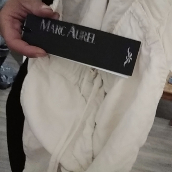 Brand new with price tag all white small/medium price tag paid 275.00 asking 250 - Picture 2 of 4